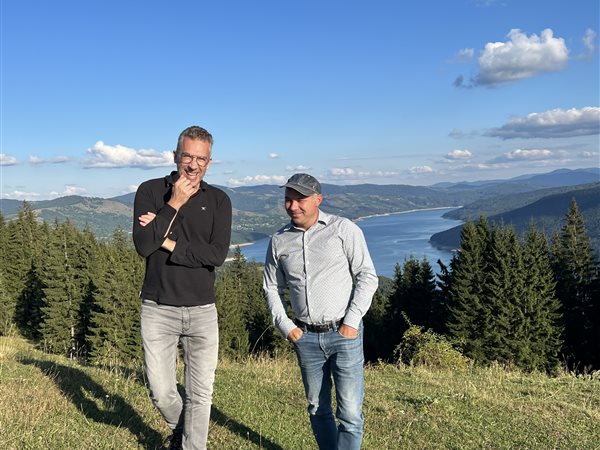 In the mountains, together with a client